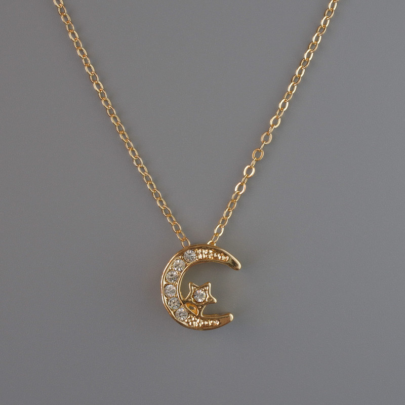 Pendant "Moon" on a golden metal chain, diameter 13x12mm, thickness 1mm + -, chain length 40-45cm +