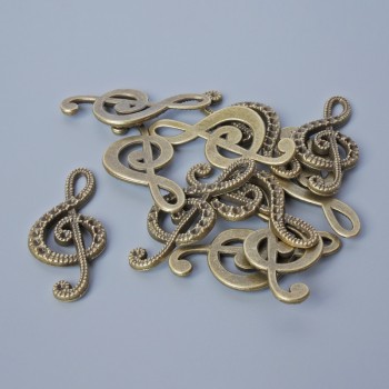 Fittings pendant "Music Key" bronze color, diameter 33×14.5 mm, bore diameter 5.5×2 mm, packaging 11 pcs ±, bronze metal color