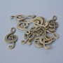 Fittings pendant "Music Key" bronze color, diameter 33×14.5 mm, bore diameter 5.5×2 mm, packaging 11 pcs ±, bronze metal color