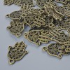Hamsa Pendant Fittings, diameter 21×15 mm, hole diameter 1.7 mm, packaged 24 pcs ±, bronze metal color