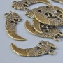 Pendant hardware "Dagger", diameter 29x13mm, hole diameter 2.1mm, packaged 10 pcs ±, bronze metal color
