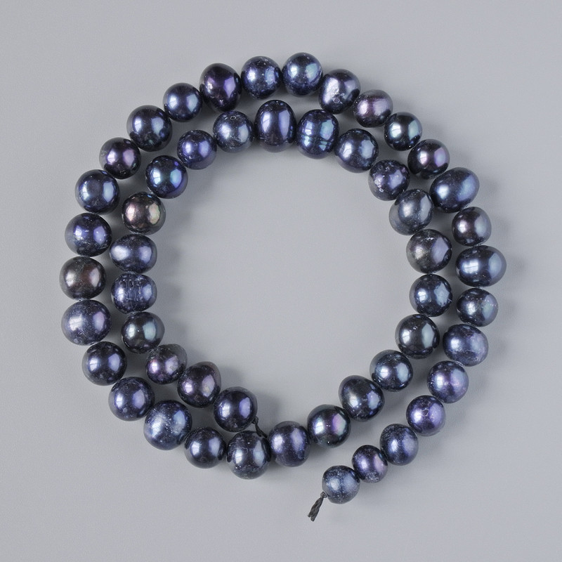 Black freshwater pearls on thread, diameter 8.5×7 mm ±, length 35 cm ±
