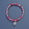 Turmaline Bead Bracelet, faceted cube, 5mm diameter ±, length 18cm ±, stretch with flower charm