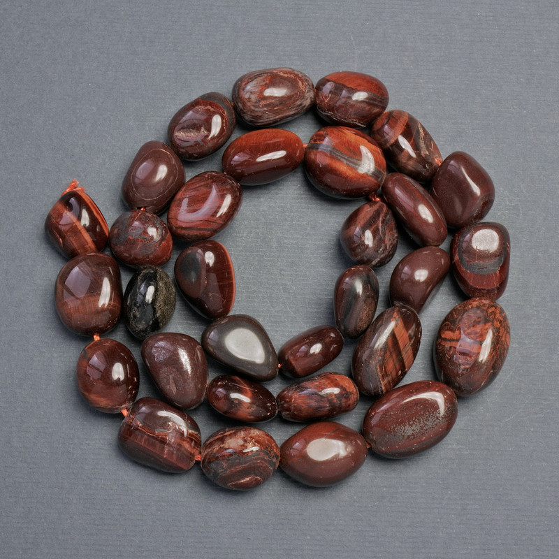 Beads made of natural stone Tiger's Eye faceted, diameter 18x12-11x10mm, +/- length 39cm