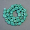 Turquoise-Color Faceted Hematite Beads, Tuned Natural Stone, Turquoise Look, Nuggets, Drill Hole 9x10 mm, Length 39 cm on Thread