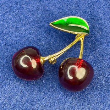 Brooch 'Cherries' green enamel, gold-toned metal 40x35 mm+