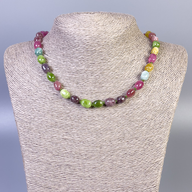 Turquoise? Wait: No, Turmalin tan? Actually gemstone: tourmaline faceted beads necklace. Use proper English: Turmaline faceted necklace, diameter 9-11×7mm, length 45cm± with clasp