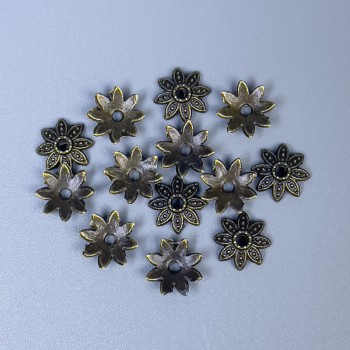 Bead cap findings in bronze color, diameter 7x0.5 mm±, hole diameter 0.5 mm±, packaging 70pcs