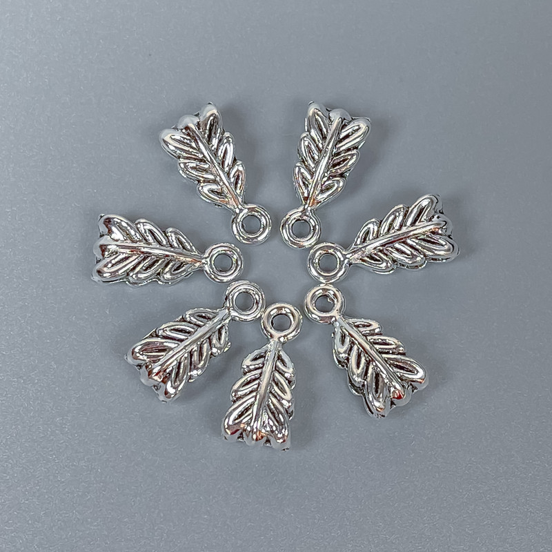 Ribbon Bail in Silver Color, size 14x7x5 mm ± holes diameter 2.5 mm ±, diameter 1.8 mm ±, packaged 22 pcs