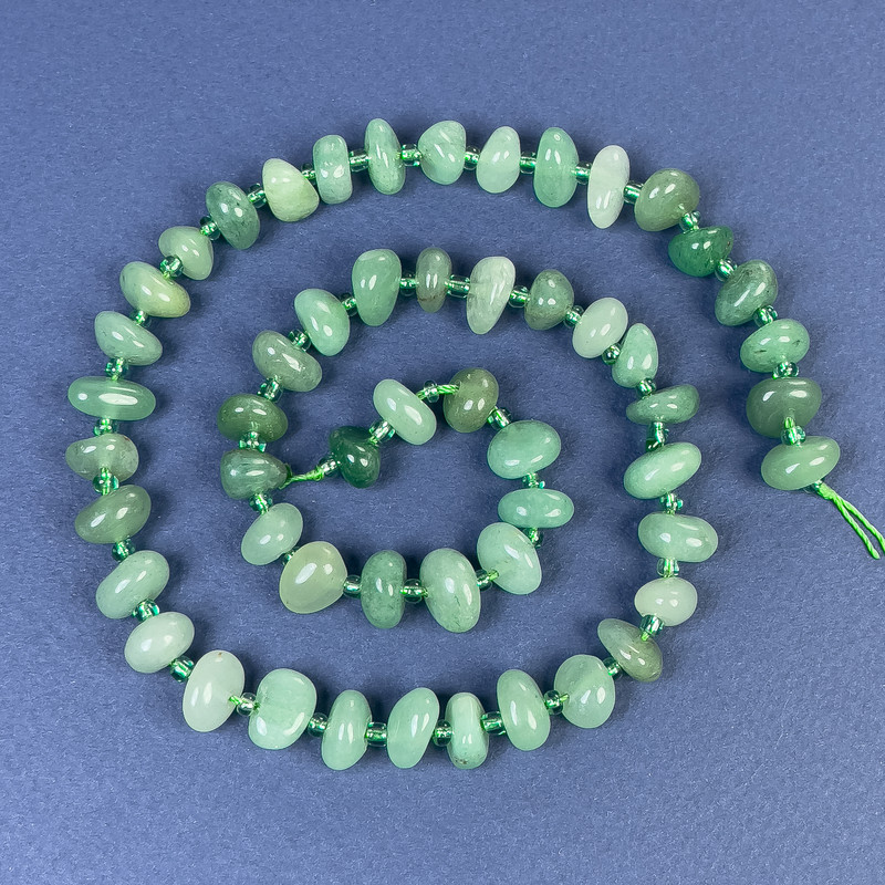 Jade Beads Faceted with Beads 10-12x6mm+- on Thread, Length 43cm+