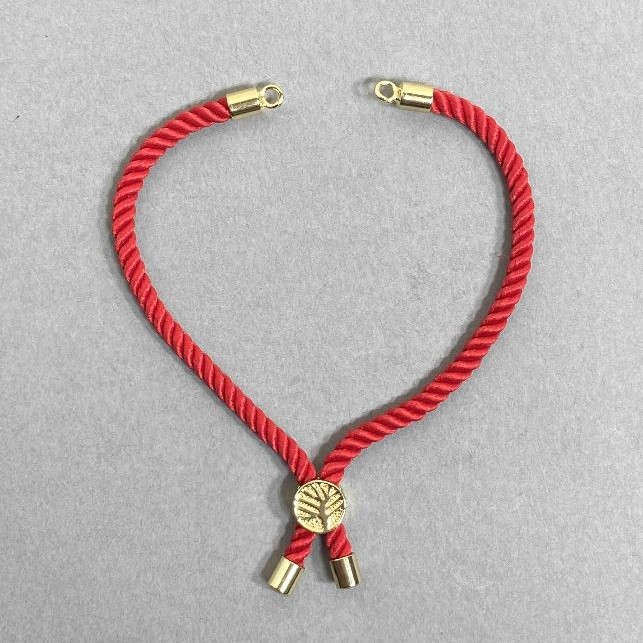 Bracelet base textile, diameter 5.5 mm± red color with metal inlay, diameter 8 mm± gold metal, length 10.5 cm+