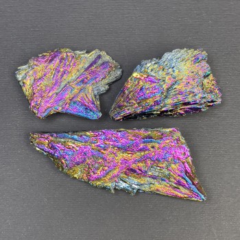 Price per 100g. Rainbow dyed kianite, weight from 24g, diameter assortment 65x23x11mm