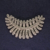 Brooch 'Feather' with white crystals, silver metal, diameter 50x43mm +