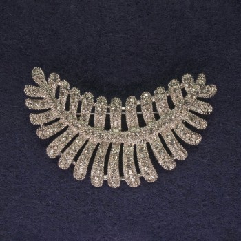 Brooch 'Feather' with white crystals, silver metal, diameter 50x43mm +