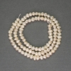 River White Oval Freshwater Pearls on Thread, 3x4 mm ± on thread, length 34 cm ±