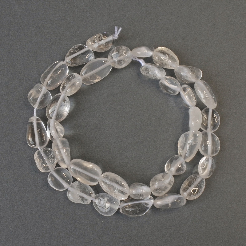 Mountain Crystal Beads, faceted, diameter 9–14 mm, ± length 40 cm on a thread