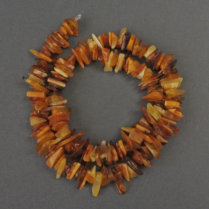 Amber Chip Beads, diameter 9-14×3mm, ± length 39cm on fishing line