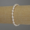Bracelet with Freshwater Pearls, oval shapes, 8x5 mm +/-, length 18 cm (stretch)