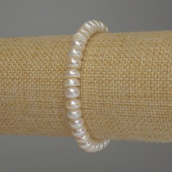 Bracelet with Freshwater Pearls, 7×5 mm, 5 mm±, length 18 cm (stretch)