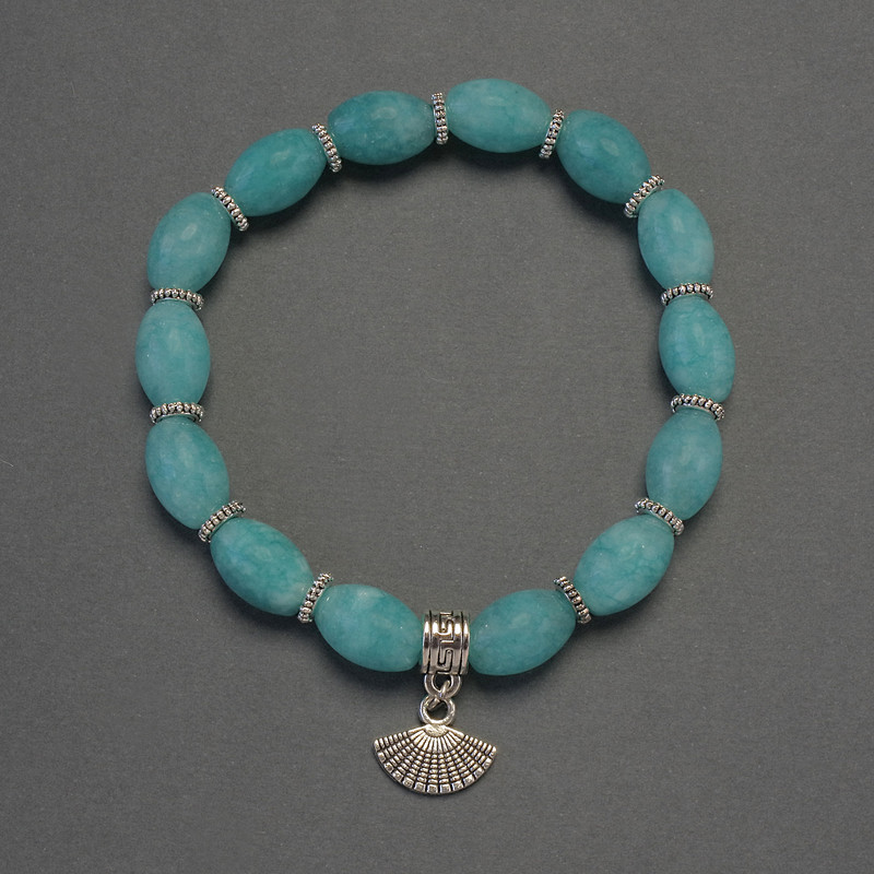 Aquamarine Bead Bracelet, 12x8mm grain beads with metal insets, length 18cm+- stretch
