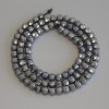Terahertz Beads Faceted Cube, 4x4 mm, approx. 39 cm length on thread