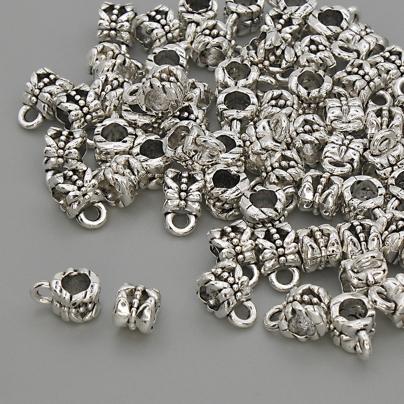 Jump ring color metal silver, diameter 4.5×7.5 mm ± hole about 3 mm; packaging 20 g (~60 pcs)