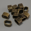 Row Spacer with Bronze Tone Insert, hole diameter 13x9mm±, insert diameter 11x7mm±, packaging 20 g (~13 pcs)