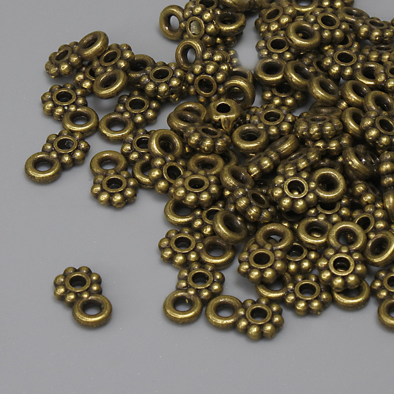 Bronze-colored Pendant, diameter 7×4.5 mm ±, hole for ear wire 1.5 mm ±, packaging 84 pcs+