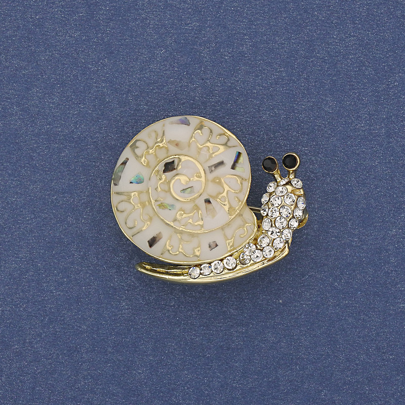 Brooch 'Snail' with chalcedony and white crystals, metal color gold, 20x26mm+