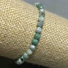 Emerald Bracelet, faceted ball, 5mm diameter ±, 18cm length ± stretch