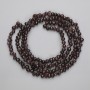 Garnet faceted beads, diameter 5–6.5×4–5 mm, on thread, length 80 cm+
