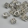 Findings Bail, metal color Silver, sizes 6.5×9.5 mm ± holes 2.2 mm and 4.6 mm, packaging 18 pcs