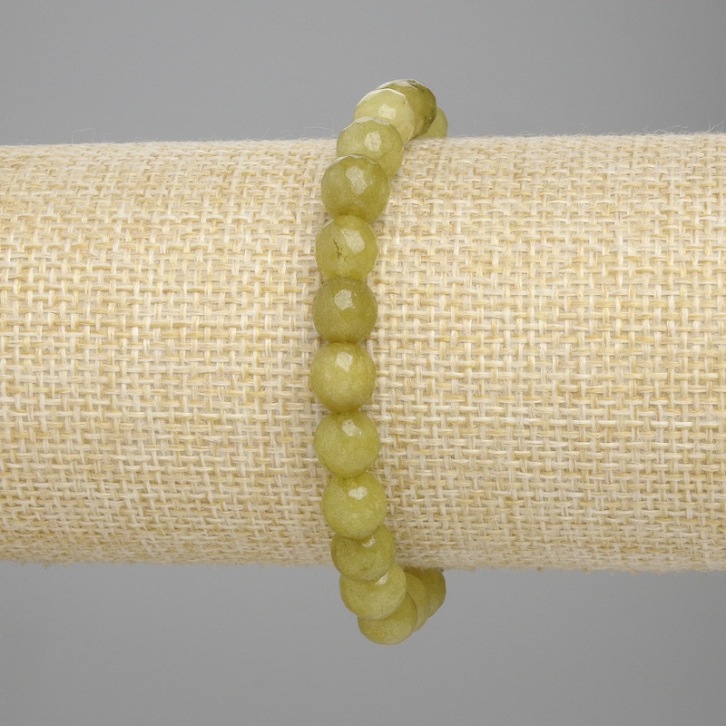 Bracelet Chrysolite Olivine faceted bead, diameter 7.5 mm +/-, length 18 cm +/- stretch