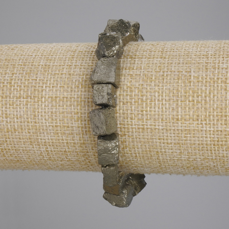 Bracelet with unprocessed pyrite stone, diameter 6-14x6-8mm +/-, length 18cm +/- stretch