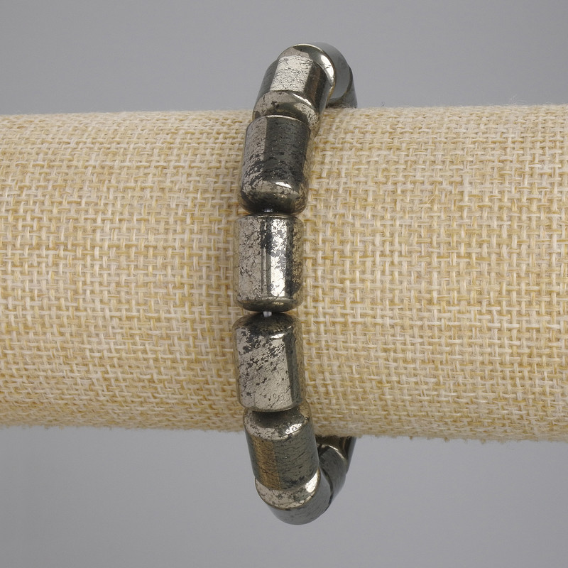 Bracelet Pyrite cylinder, diameter 14x10mm +- , length 18cm +- stretch