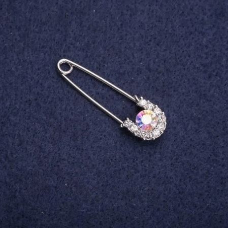 Brocchpin with white rhinestones 37x11mm silver-toned metal
