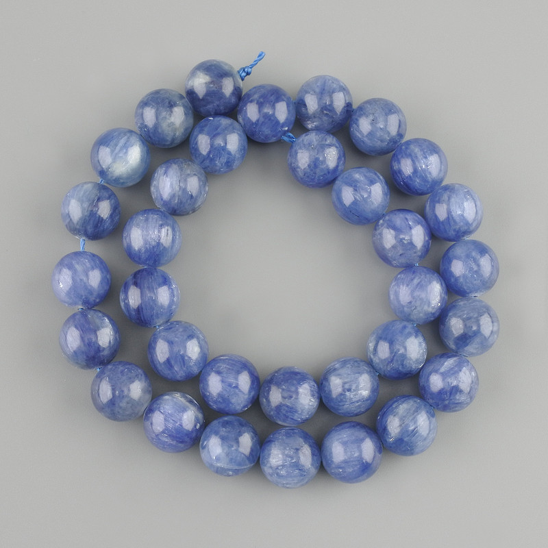 Natural stone beads Kyanite smooth round bead, diameter 12mm+-, length 39cm+- on a thread