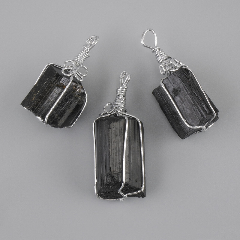 Unprocessed Tourmaline Schorl pendant in a silvery wrap 24x22mm+-, length 43mm+-(assorted sizes)