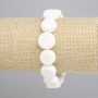 Pebbled coral bracelet coin shape, diameter 14 mm +/-, length 18 cm +/- stretch
