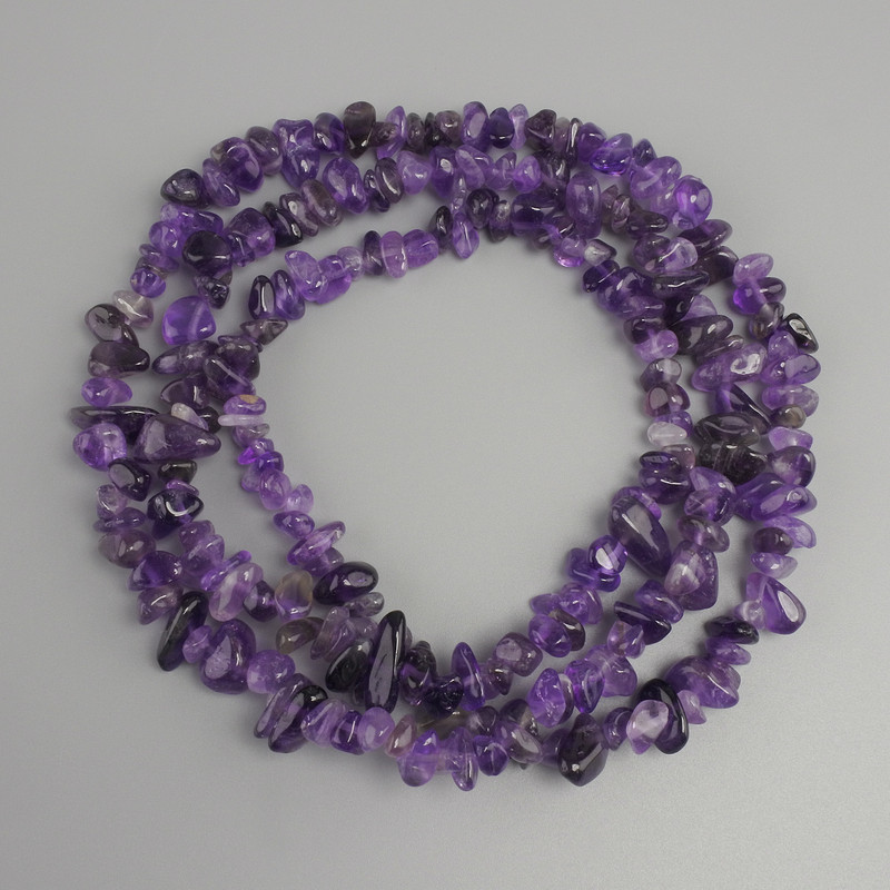 Amethyst beads (tumbled chips), diameter 7-14x2-7, 5mm+-; length 80cm+- on thread