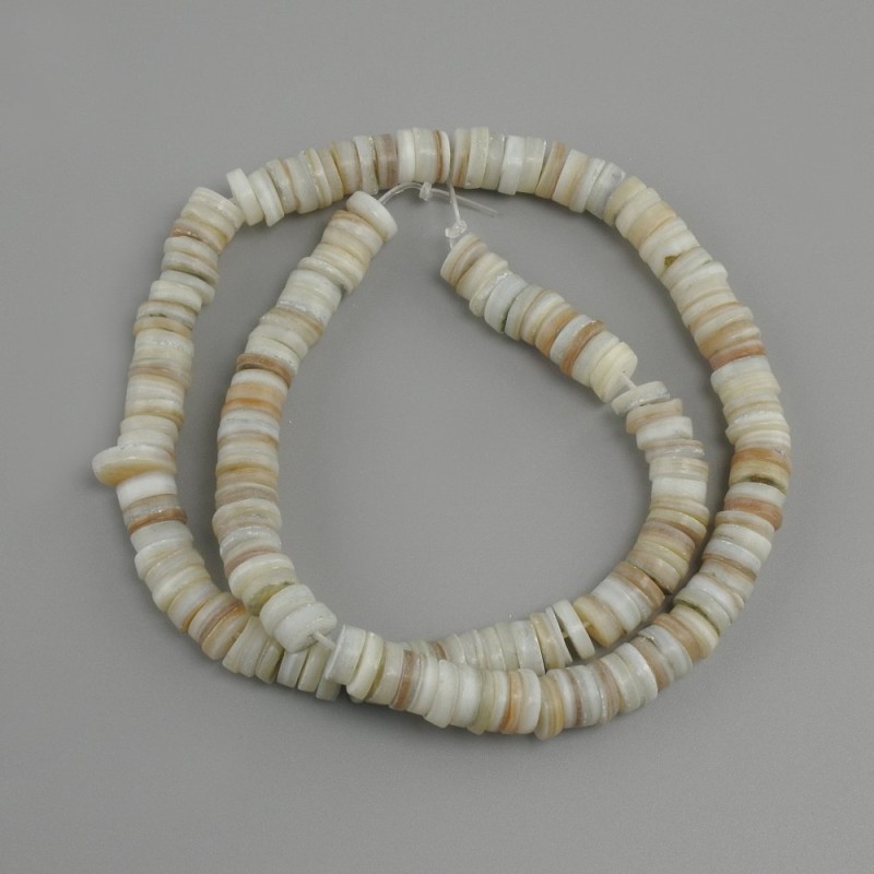 Shell beads Scapharca rondelle, diameter 7x1, 5-2mm+-, length 39cm+- on a thread
