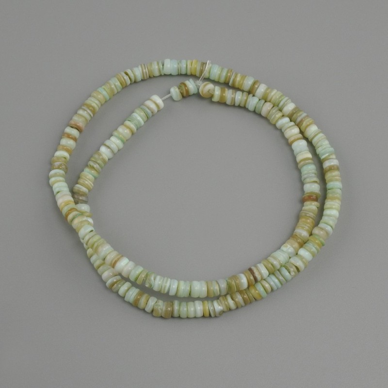 Abalone shell beads (Scapharca) rondelle, diameter 4×1.5–2 mm ±, length 38 cm ± on a thread