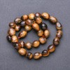 Tiger's Eye Natural Stone Tumbled Beads on a Strand, diameter 9-12x8mm +/-, length 38cm