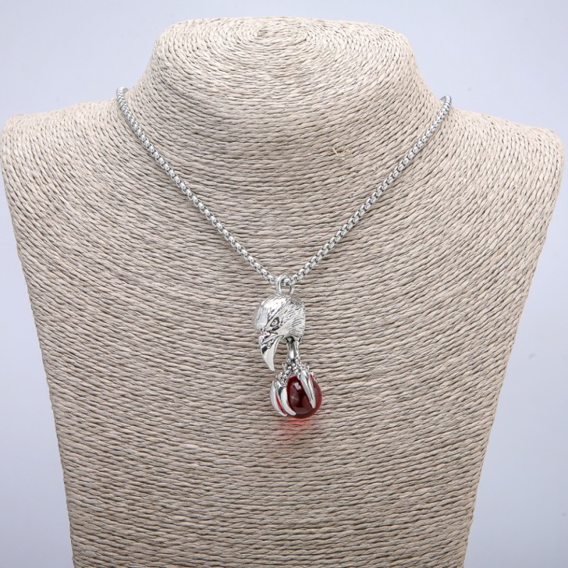 "Bird with Ball" Pendant 47x18mm on chain, 70cm length, silver-tone metal
