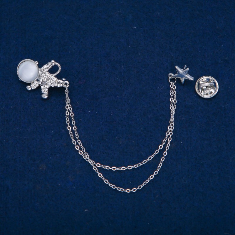 Astronaut Brooch with Cat's Eye Cabochon and White Rhinestones, silver-tone metal 27x20mm +/-, length 12cm +