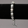 Bracelet on Elastic Band with River Pearls, Silver-Tone Inserts and Charms, diameter 8mm+/-, length 18cm+