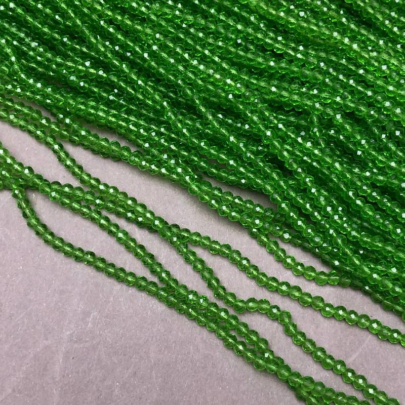 Beads Czech Crystals on fishing line light green transparent faceted rondelle, diameter 3x2.5mm + -, length 36cm +