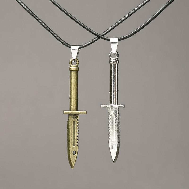 Pair of Knife Pendant Necklaces on Cord 70x12mm + -, length 45-50cm