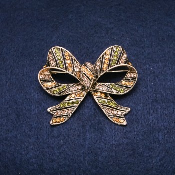 Brooch Accent Bow 55x45mm rhinestones color green yellow gold-toned metal