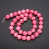 Turquoise? Wait: no. It's artificial tourmaline beads linked as thread with smooth ball diameter 10mm, length 38cm.